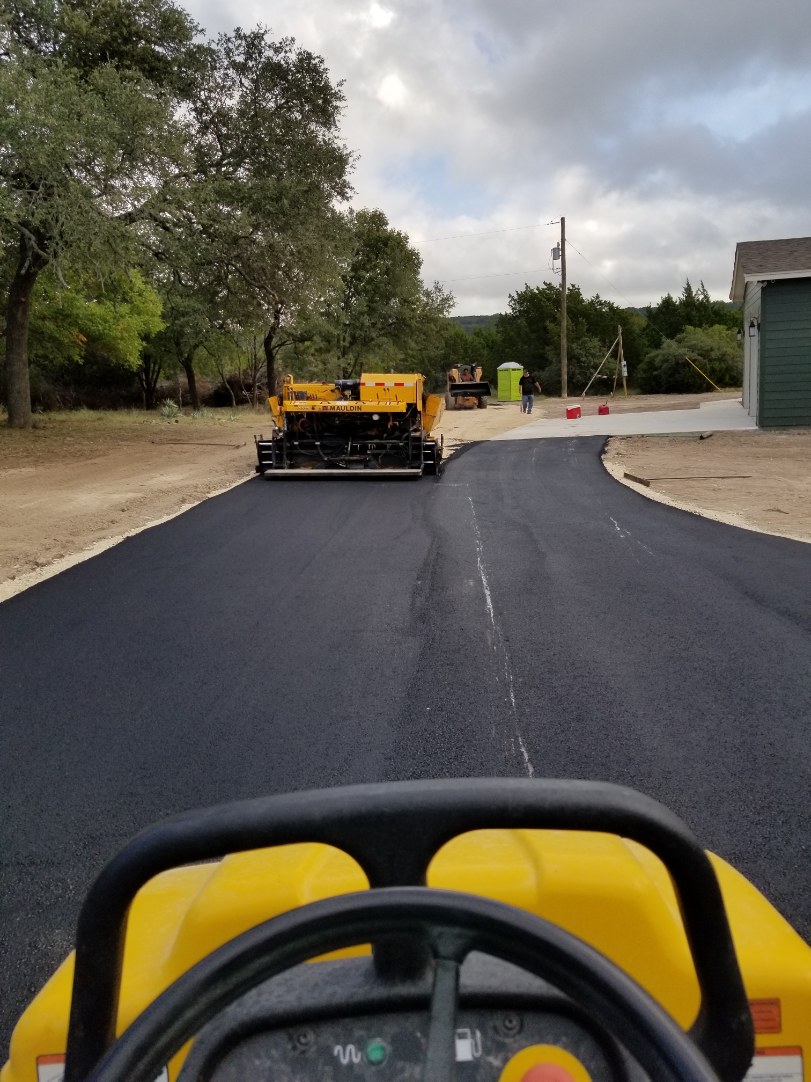 Asphalt Paver Flattening New Asphalt in Austin, TX